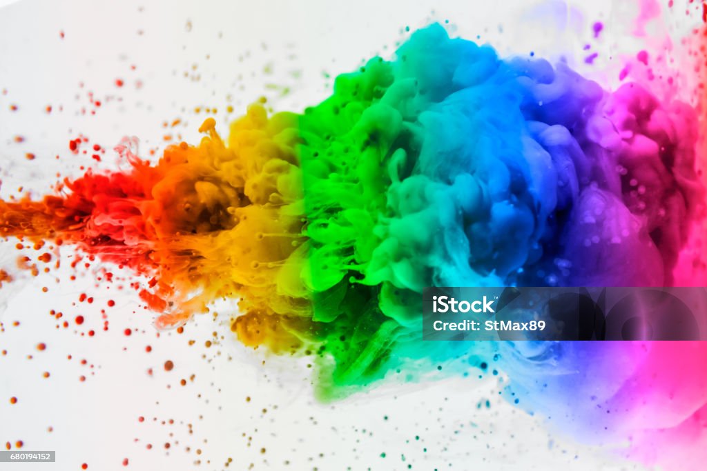 Acrylic colors and ink in water. Abstract frame background. Isolated on white. Rainbow Stock Photo