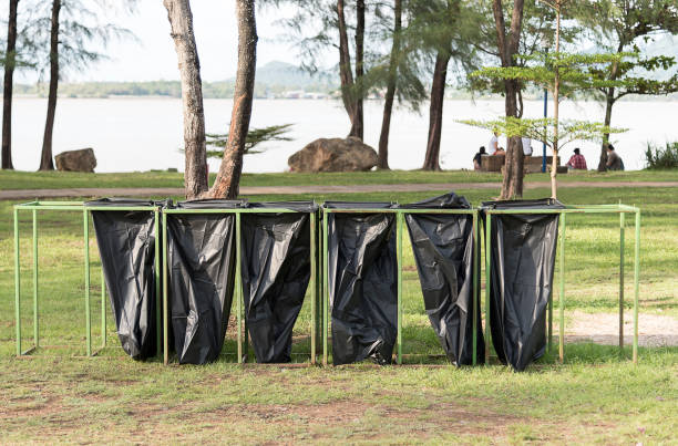 istock Six Black garbage bags on the park 680194424