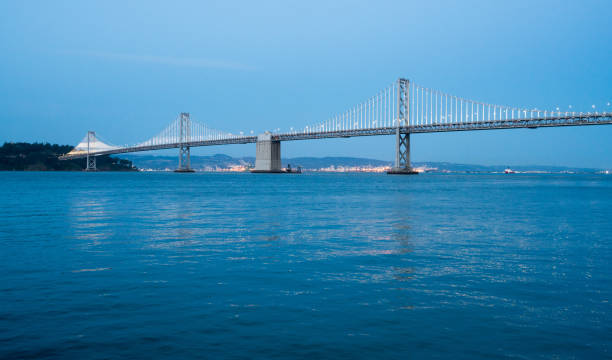 istock San Francisco Bay bridge illuminated at night 680198008