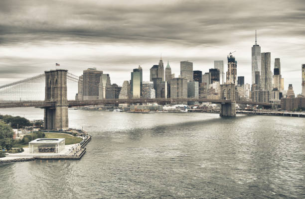 istock Manhattan with Brooklyn Bridge at twilight. 680213990