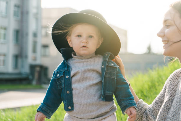 istock Mother holding little boy in the park 680220898