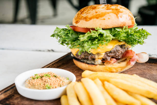 istock beef burger with fries and mustard sauce set snack meal 680226832