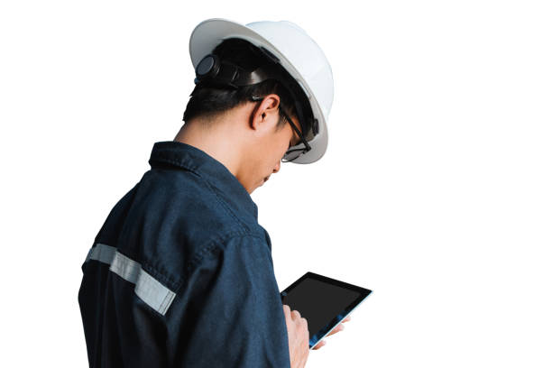istock Engineer or Technician in white helmet, glasses and blue working shirt suit using a digital tablet, isolated on white, Electricity and Oil and Gas industrial concept with clipping path. 680235462