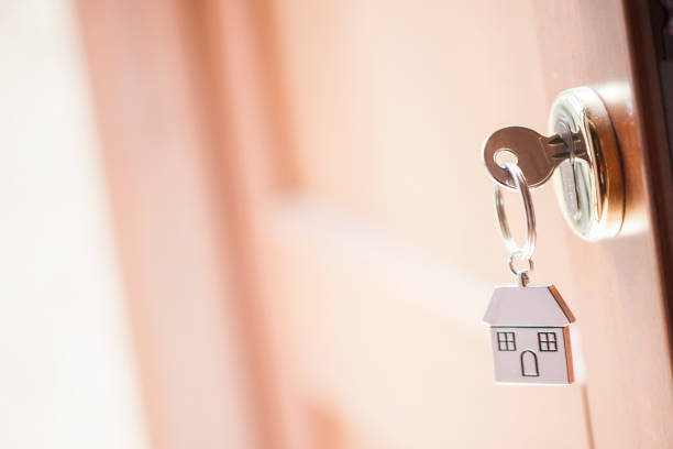 istock House key in the door 680249276