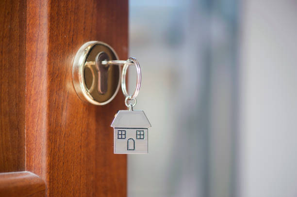 istock House key in the door 680249536