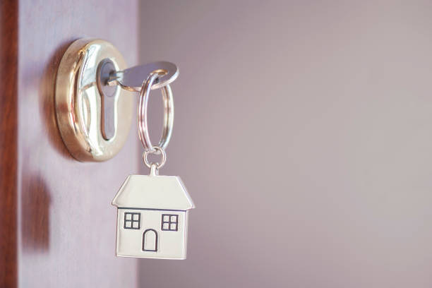 istock House key in the door 680249730