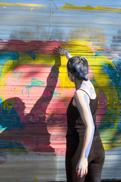 istock Female artist painting 680250882