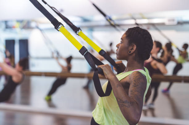 istock Group of Women Doing TRX Workout 680250926