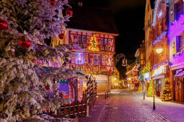 French city Colmar on Christmas Eve Traditional old half-timbered houses in the historic city of Colmar. Decorated and lighted during the Christmas season. Alsace. France. colmar stock pictures, royalty-free photos & images