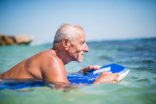 istock Athletic senior man in the ocean 680262348