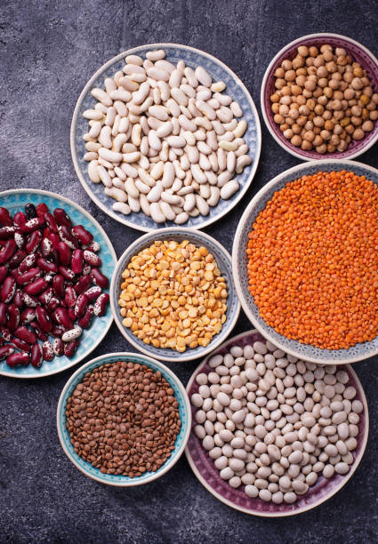 istock Various legumes. Chickpeas, red lentils, black lentils, yellow peas and beans 680265432