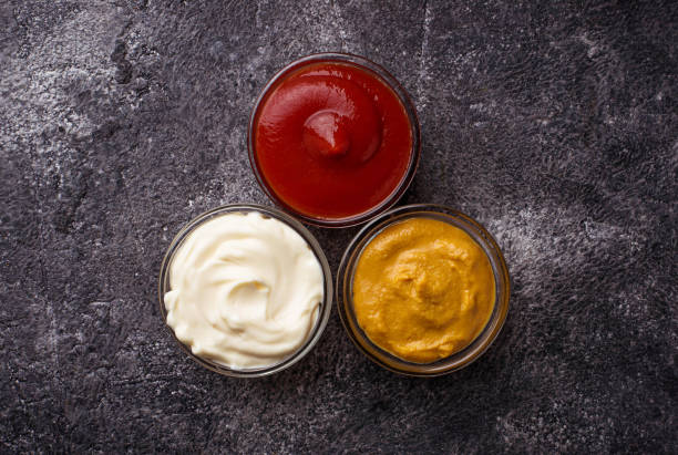 istock Set of different sauces: mustard, ketchup, mayonnaise. 680265676