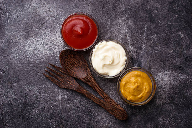 istock Set of different sauces: mustard, ketchup, mayonnaise. 680265682