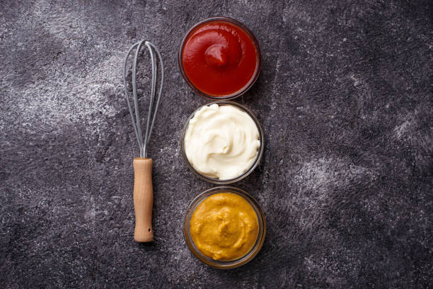 istock Set of different sauces: mustard, ketchup, mayonnaise. 680265686