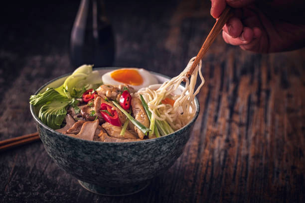 Miso Ramen Noodle Soup Delicious Miso Ramen Noodle Soup with fresh vegetables, ramen noodles and cooked egg tokyo ramen stock pictures, royalty-free photos & images