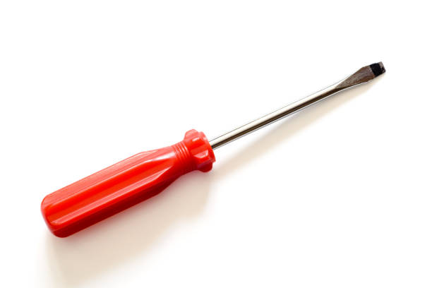 istock Cheap screwdriver with red handle isolated on a white background 680268460