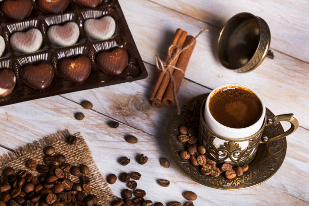 istock Turkish coffee with chocolate and traditional copper serving set on wooden 680268578