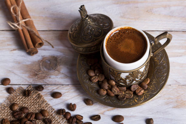 istock Turkish coffee with chocolate and traditional copper serving set on wooden 680268584