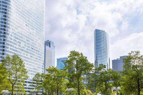 istock Modern business district with green trees and skyscrapers, Paris 680274100