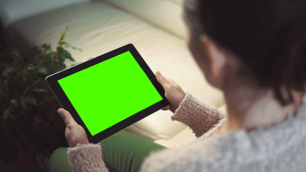 istock Woman Use Tablet Pc Sitting on Sofa 680283332
