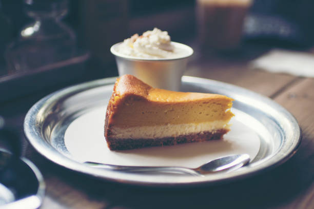 istock cream cake in coffee cafe, vintage filter image 680287140