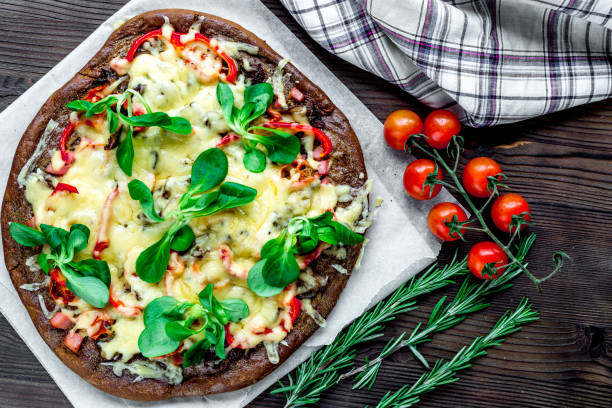 istock restaurant kitchen with pizza preparing on wooden background top view 680287948
