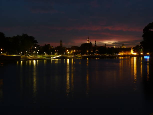 istock Beautiful and colorful sunset over Wroclaw. Reflection in the Odra River. 680295390