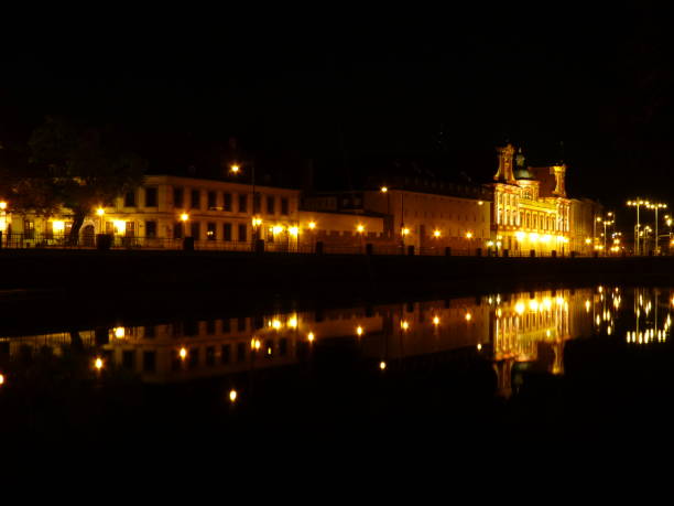 istock Wroclaw at night. Beautifully lit buildings reflecting in the Odra river. 680302930
