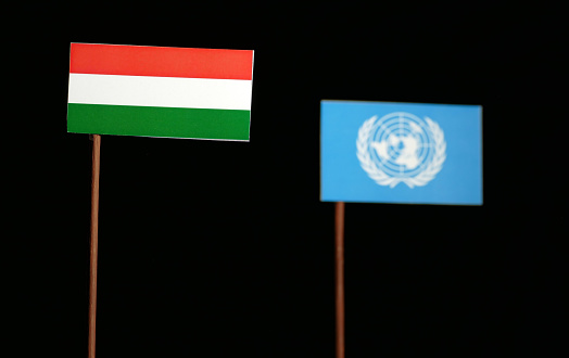 Belgrade, Serbia. May 5th 2017: Hungarian flag with United Nations flag isolated on black background