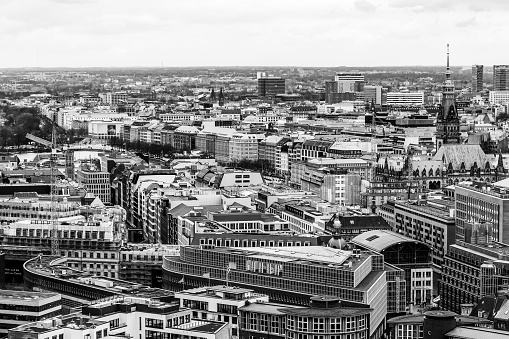 Hamburg, Germany - March 06, 2023: Black and white panorama view of downtown Hamburg with Elbe river and port, horizontal format