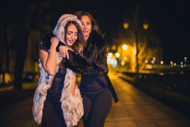 istock Two woman having fun at the night out 680312354