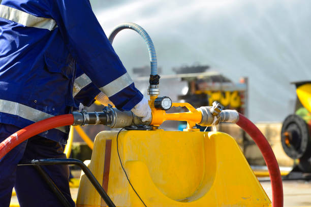 istock Fireman in action activated foam.close up . 680330988