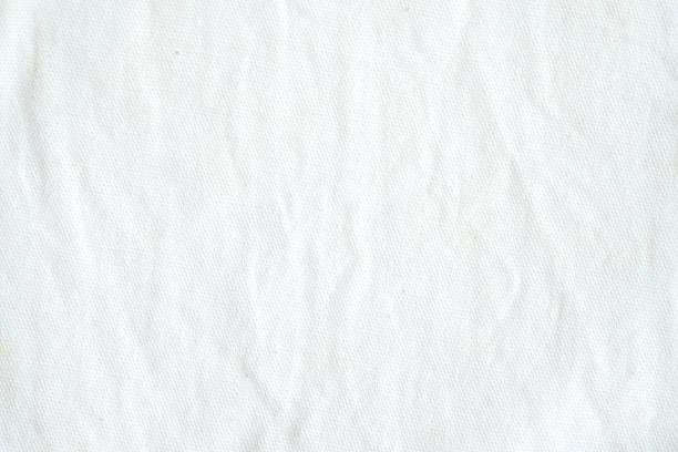 istock Wrinkled white cotton fabric texture background, wallpaper 680337618