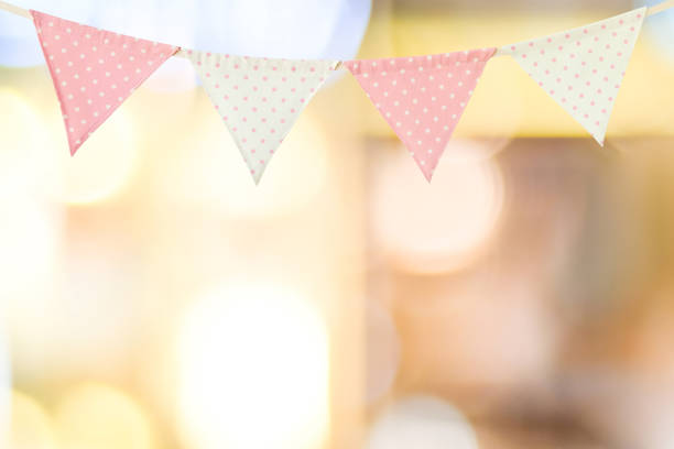 istock Bunting party flag on blur abstract bokeh light background, with copy space for text, holiday concept background 680337786