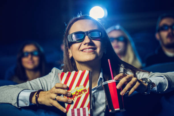 istock Cute girl in cinema 680346536