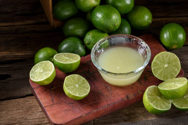 Lime with Juicer stock photo