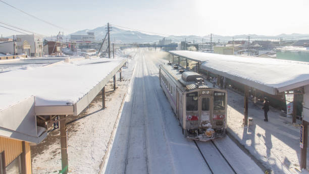Hokkaido: A train is approaching the train station in Hokkaido.