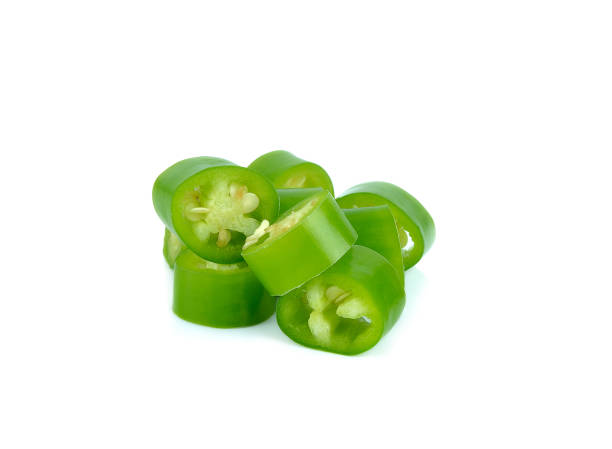 istock fresh green cut chili pepper pieces on a white background 680356704