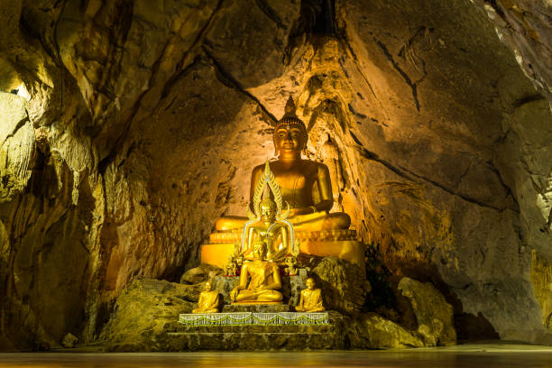 istock Gold Buddha meditating in a cave in Thailand 680359104
