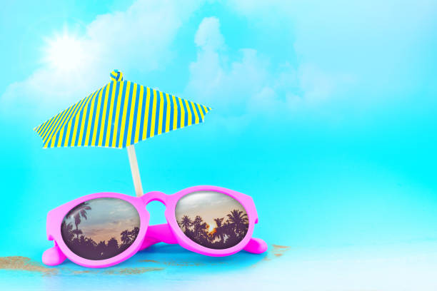 istock Pink Sunglasses reflection sunset at palm tree landscape scene with sand and sun,Summer Time concept,Leave space for adding your content or text 680360292