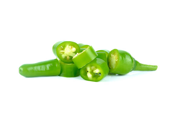 istock fresh green cut chili pepper pieces on a white background 680363072