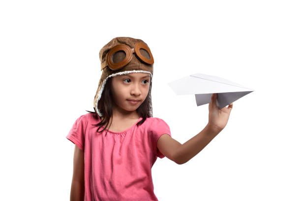 istock Happy asian kid playing with paper toy airplane 680363334