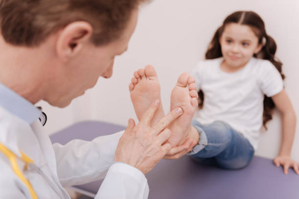 istock Thorough determined specialist comparing the state of the feet 680373452