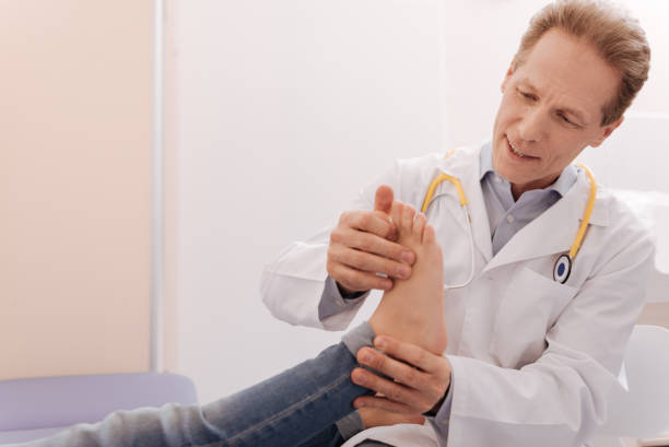 istock Friendly careful rheumatologist making sure patient being healthy 680373578