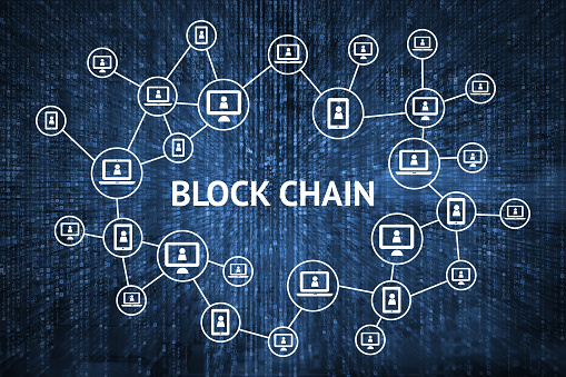 Blockchain network concept , Distributed ledger technology , Block chain text and computer connection with blue matrix coded background