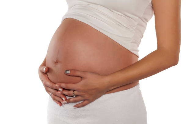 istock Close up of a cute pregnant belly 680384128