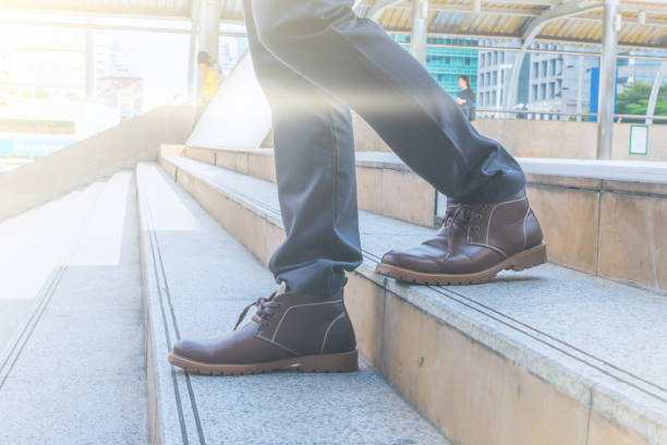 istock The business man walking down the staircase go to work 680384234