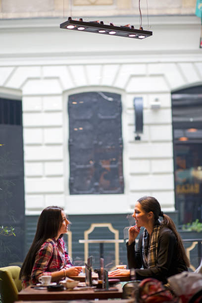 istock Two girl enjoy a coffee break 680386048