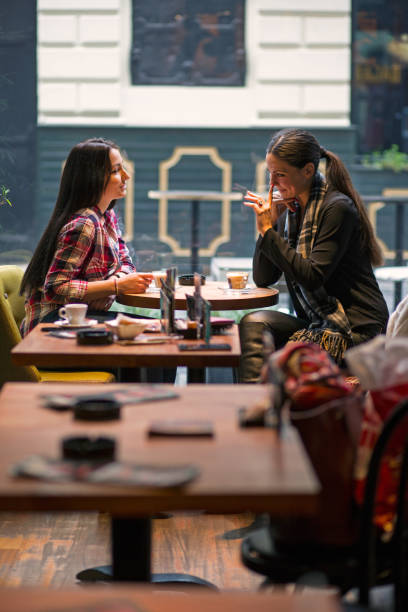 istock Two girl enjoy a coffee break 680386078