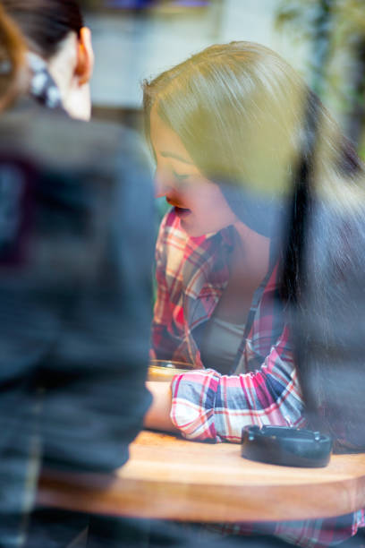 istock Two girl enjoy a coffee break 680386096